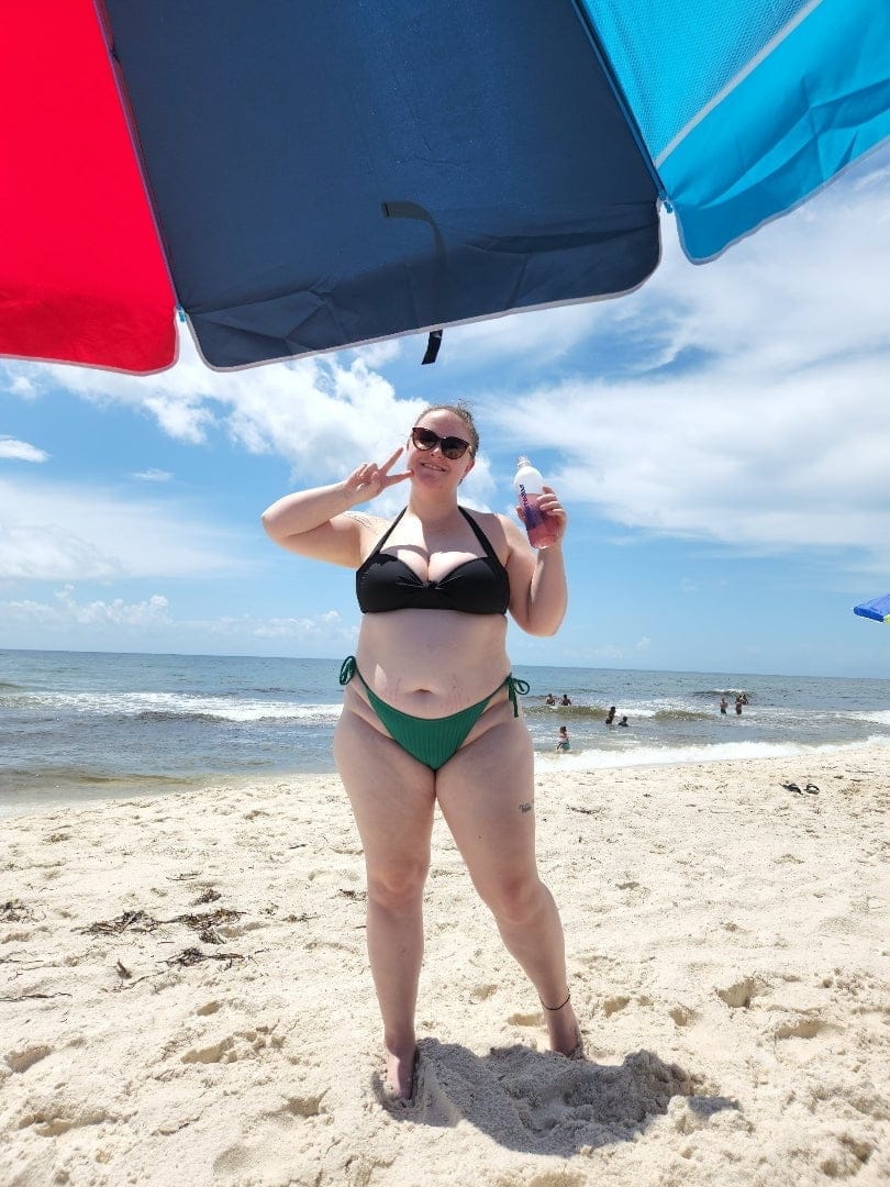 A thick girl in a string bikini