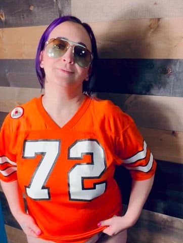 Thicker Dropping these big tits in hubbys old football jersey