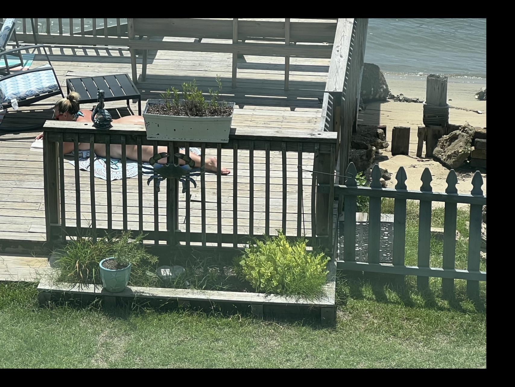 When your wife spots you tanning butt naked on the